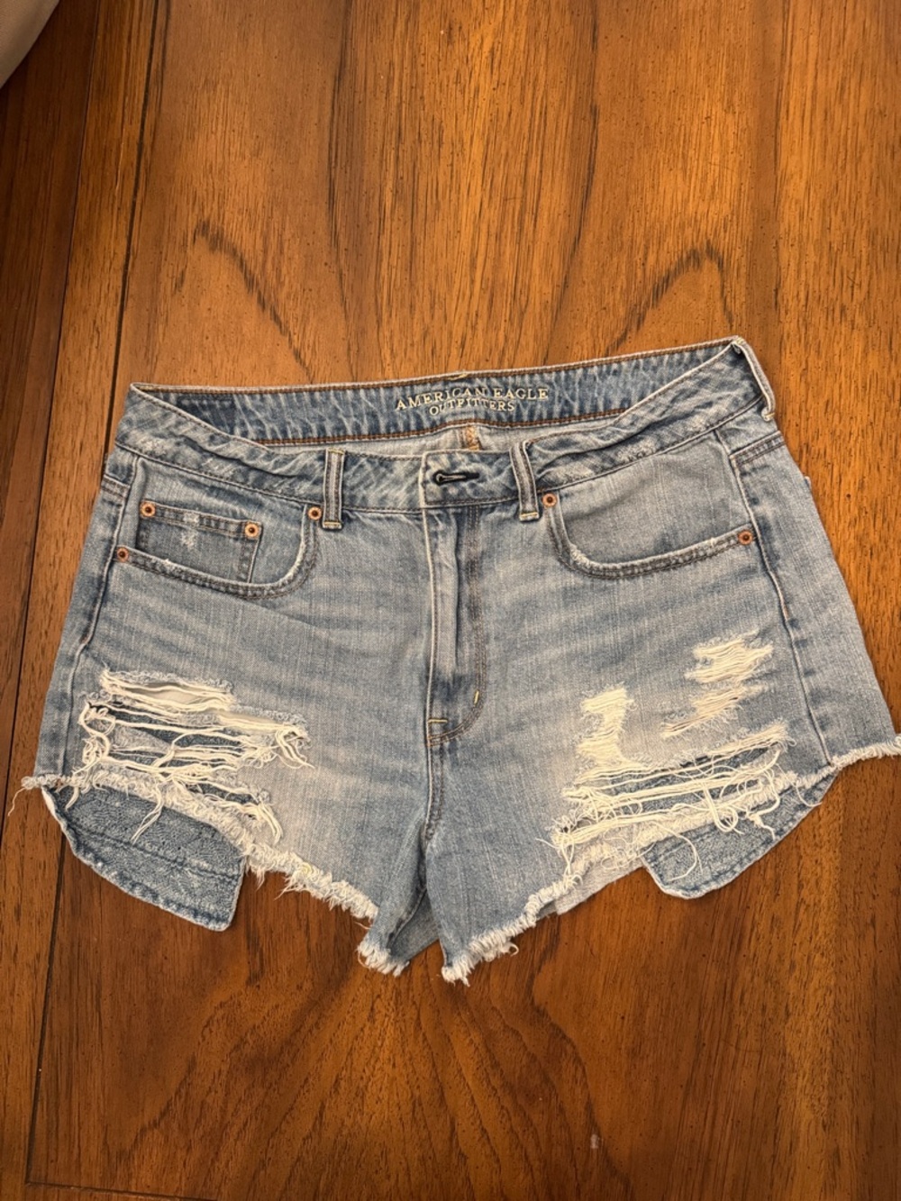 American Eagle Hi-Rise Festival Light Blue Distressed Denim Cutoff Shorts